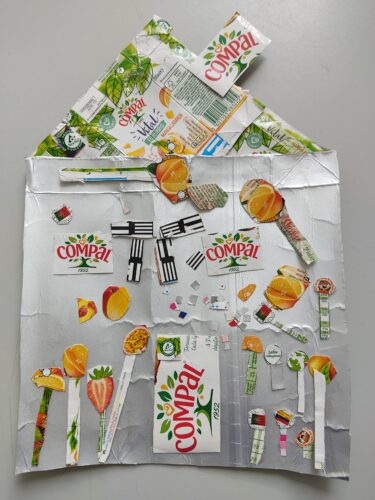 "Casinha", com embalagens do sumo Compal.
